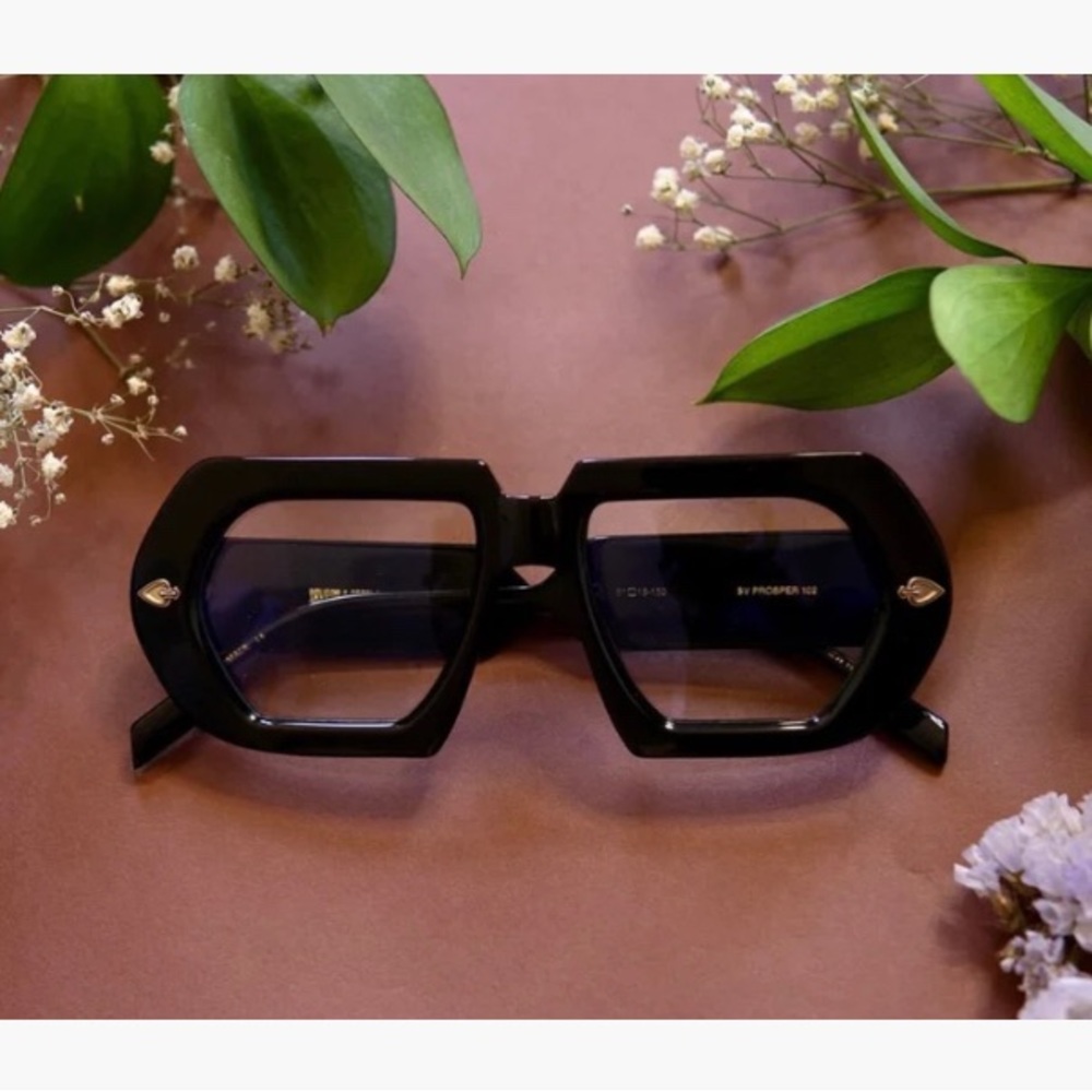Savant & Scholar black framed eyeglasses.